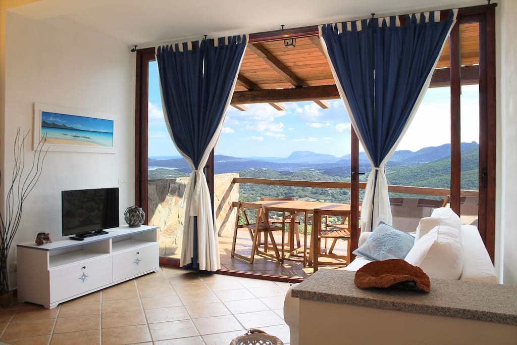 Large window and terrace overlooking on the whole valley. It's possible enjoy the view sitting comfortably on the sofa.