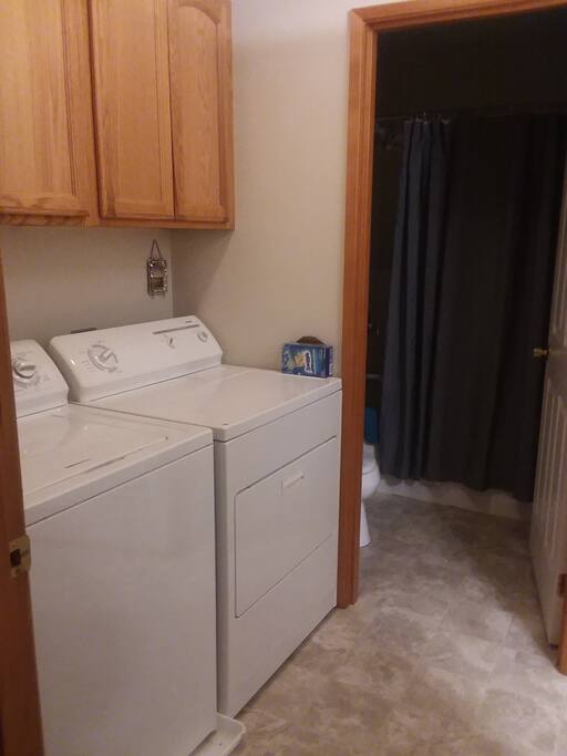 Full size washer and dryer. Toilet and shower is in a different room then the washer and dryer/ sink wash area.