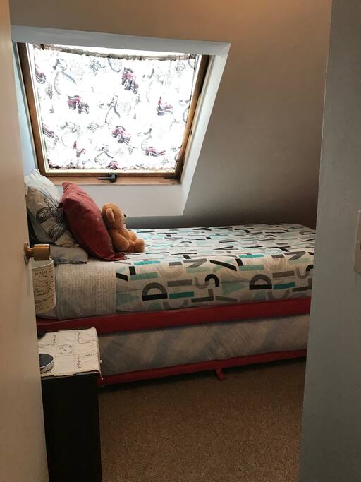 Two beds in one room (the lower one is a bit smaller than the upper on). A very cozy room!