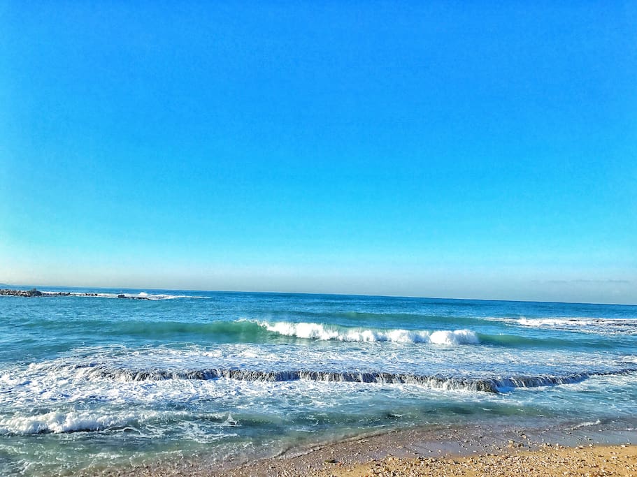 The gorgeous beach of the neighborhood which you can reach there by 2 min walking or even less.