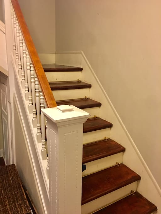 Staircase up to 2nd floor from the living room. Brazilian cherry hardwood floors throughout the house.