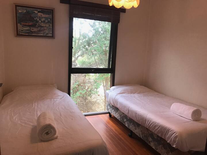 Chambre 3 confortable avec des sons de l'océan