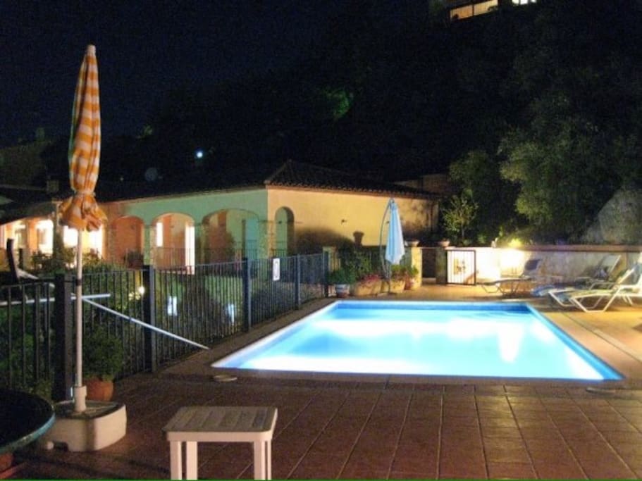 Private pool area at night