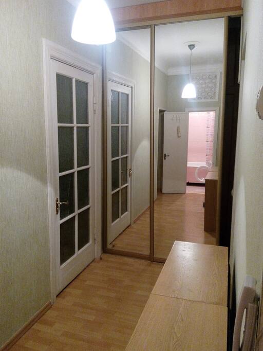 Entrance hall with large mirrored wardrobe