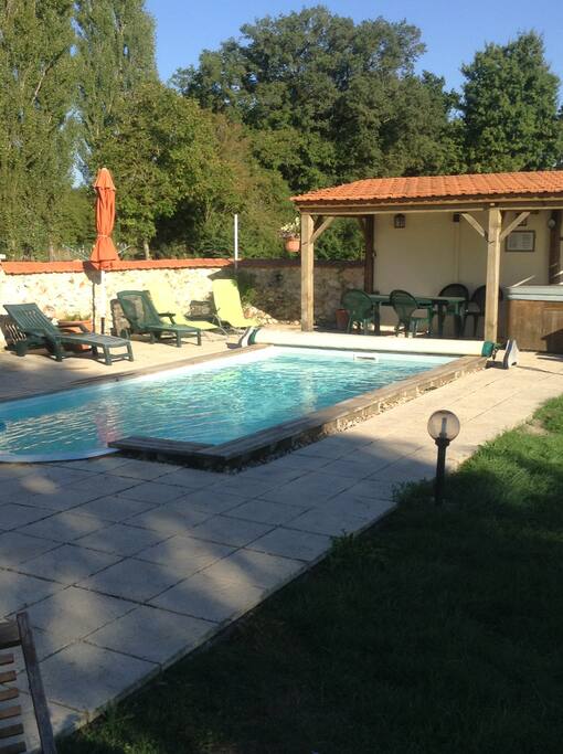 Our pool area complete with loungers