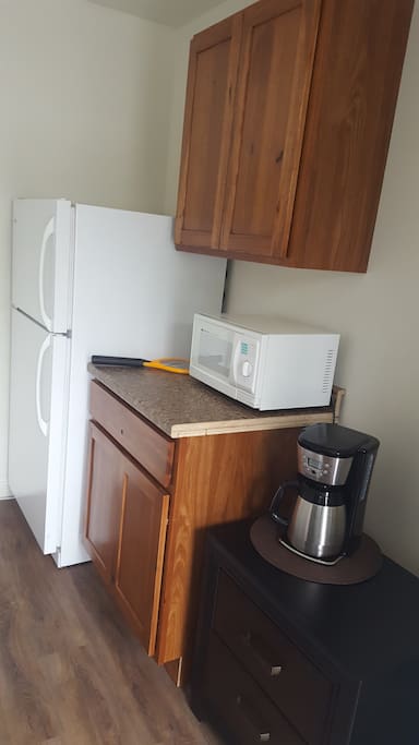 Fridge, microwave and coffee in every room
