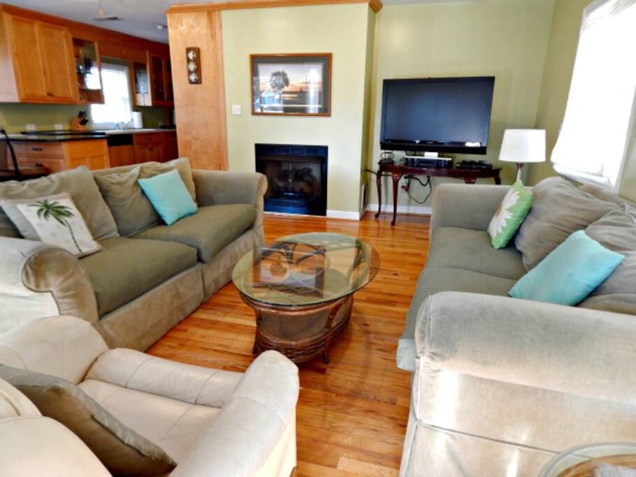 Open floor plan. Living room seating and TV