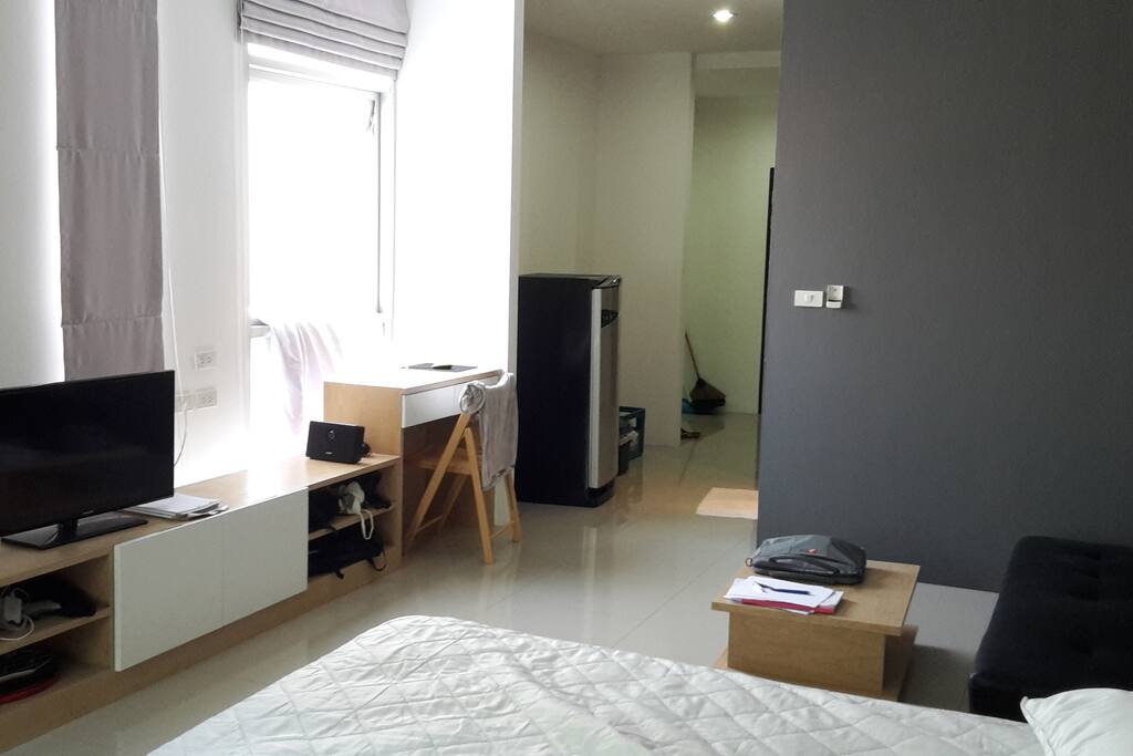 TV, desk, fridge.