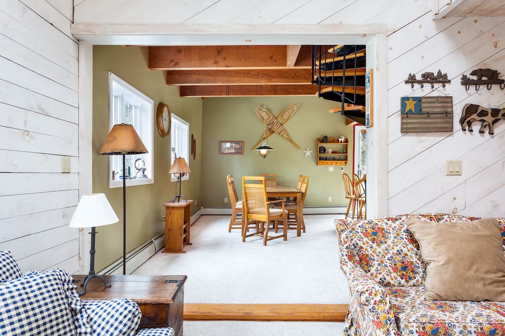 Enjoy a meal with friends and family in the dining room with beautiful exposed wood ceilings.