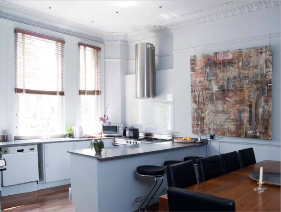 Kitchen, breakfast bar and dining Table