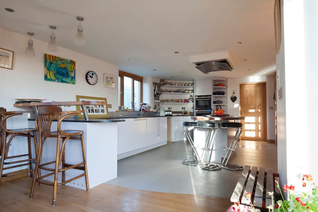 My favourite morning spot! The light floods in most of the day and its a good place to hide when the kids are watching tv. In the summer we live with the french doors open and its a lovely space to catch a breeze and chill.