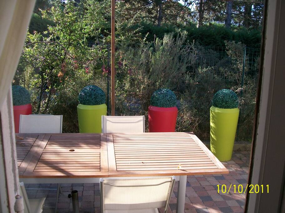 Terrasse avec tonnelle