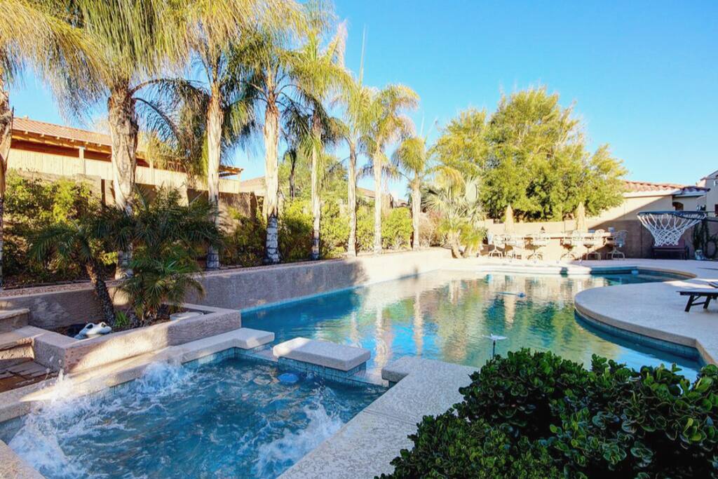 Over size lap pool that you will enjoy with a larger than normal spa attached and built in bar stools