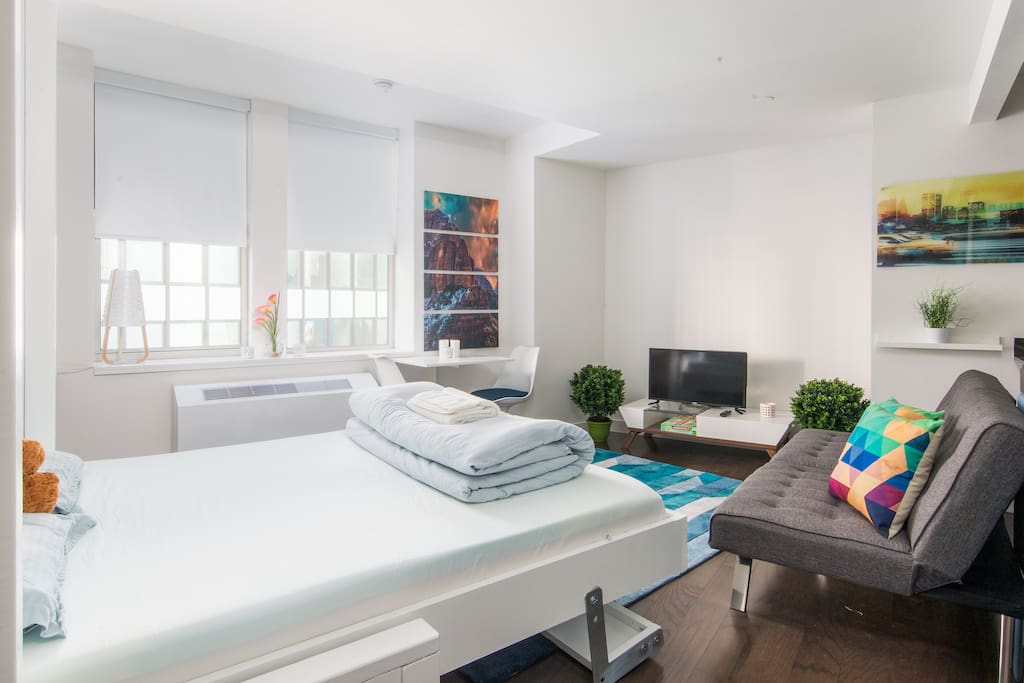 Murphy Queen bed with premium memory foam and soft, clean bedding.