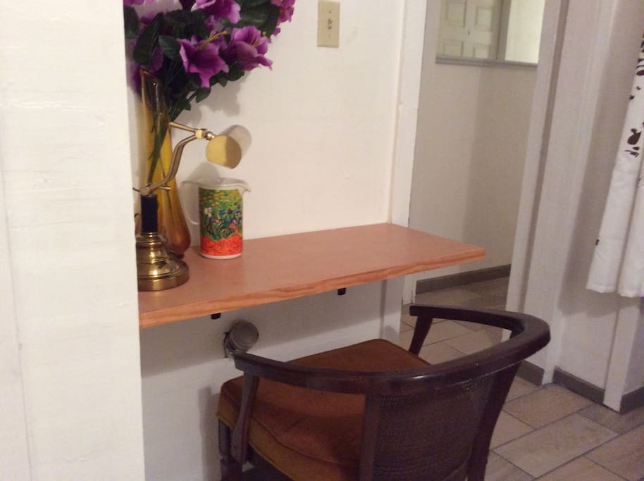 Desk across from large closet