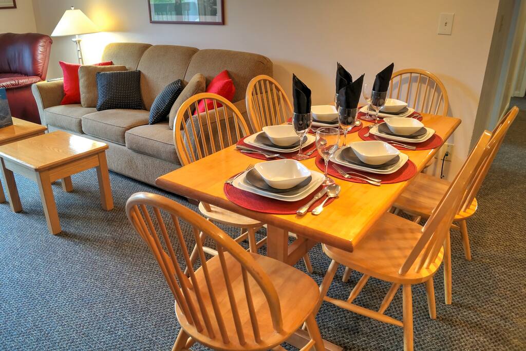 Dining table, very comfortable queen pull out sofa bed and comfy leather recliner