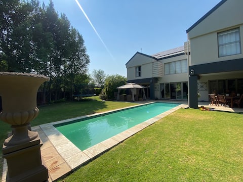 Riverfront Golf Estate home with pool