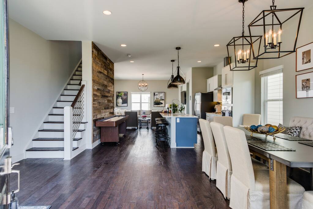 Open, bright floor plan with Restoration Hardware furnishings