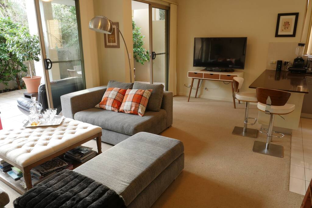 Large TV and relaxing lounge space
