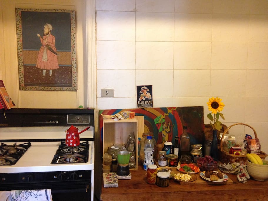 Colourful kitchen. Gas stove and oven with other essential items
