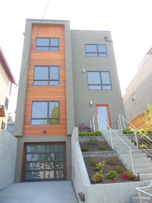 Front view of the three-story contemporary house.