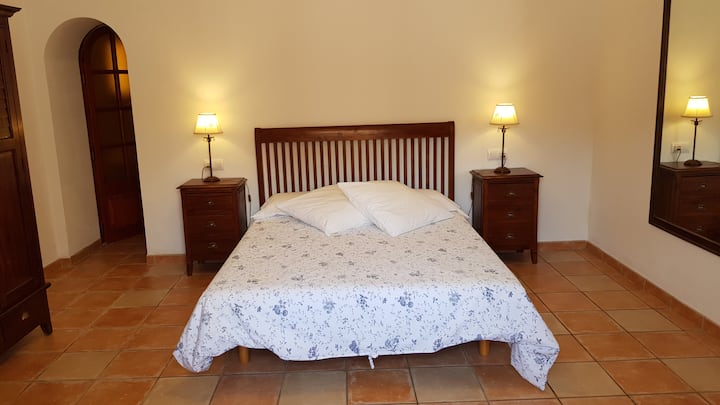 Dormitorio 1.º  en planta baja.