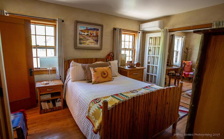 Custom handmade furniture made in Santa Fe, wood floors throughout