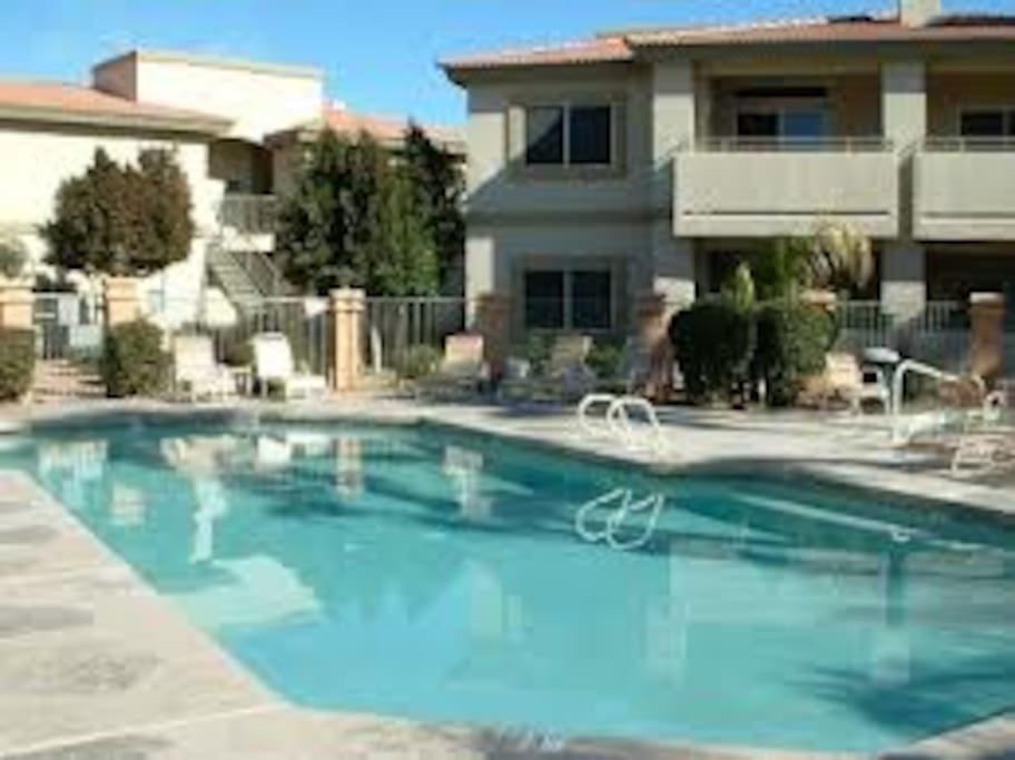 one of 3 heated pools and spas w/ bb q grills, tennis & basketball