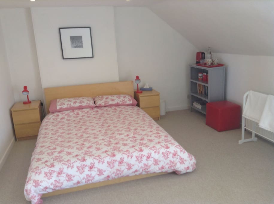 Spacious double bedroom with tea and coffee making facilities.