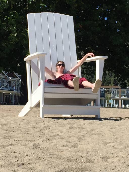 Relax in the huge adirondack chair on the beach!