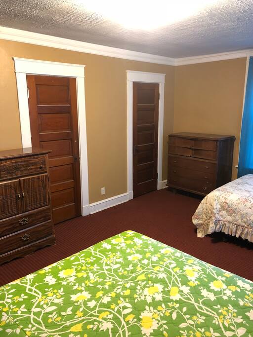 (3rd view)Bedroom #4 is equipped with two queen size beds, dresser drawers and closet space. This room is ideal for a small family, two friends, roommates or travel partners. This is located on the 2nd floor. A personal door “lock key” will be issued to make your room a private stay.