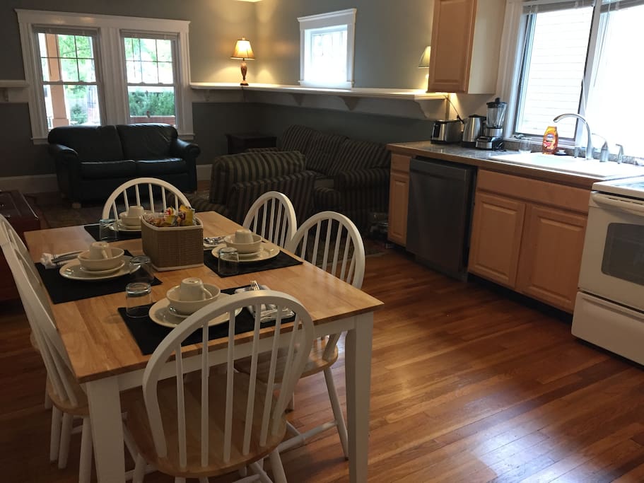 Open space with living room, dining area, and kitchen