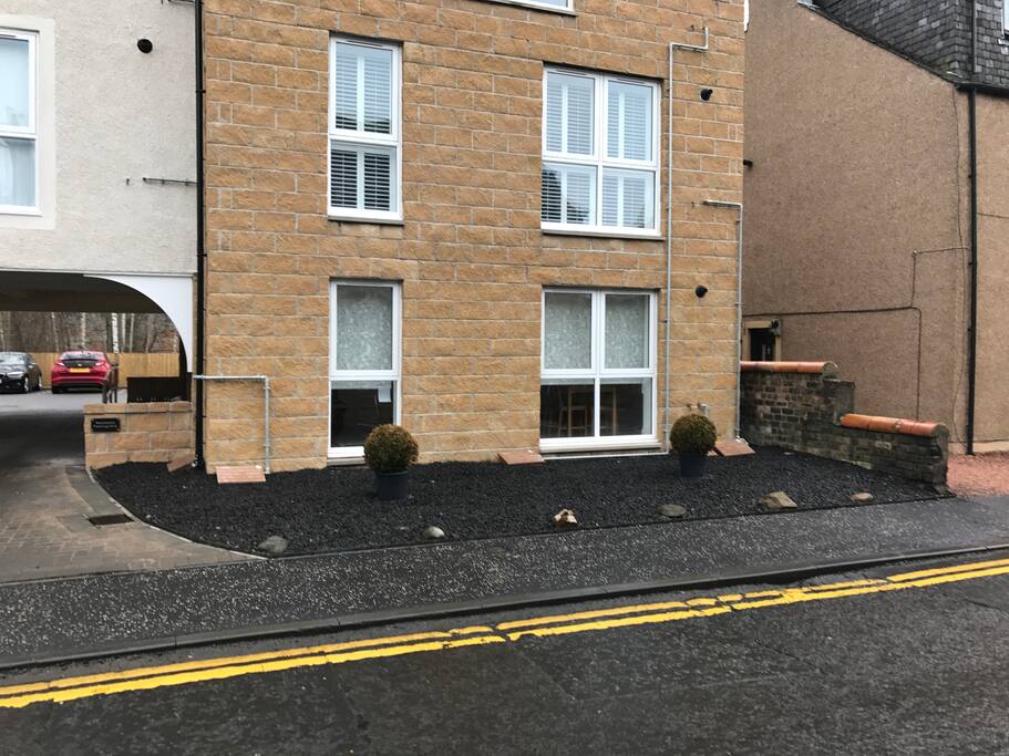 Outside view and free parking inside
