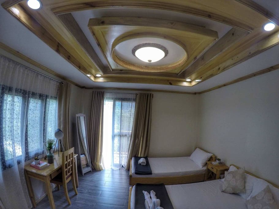 1 queen size and 1 single bed good for 3 persons with toilet and Bath and with balcony