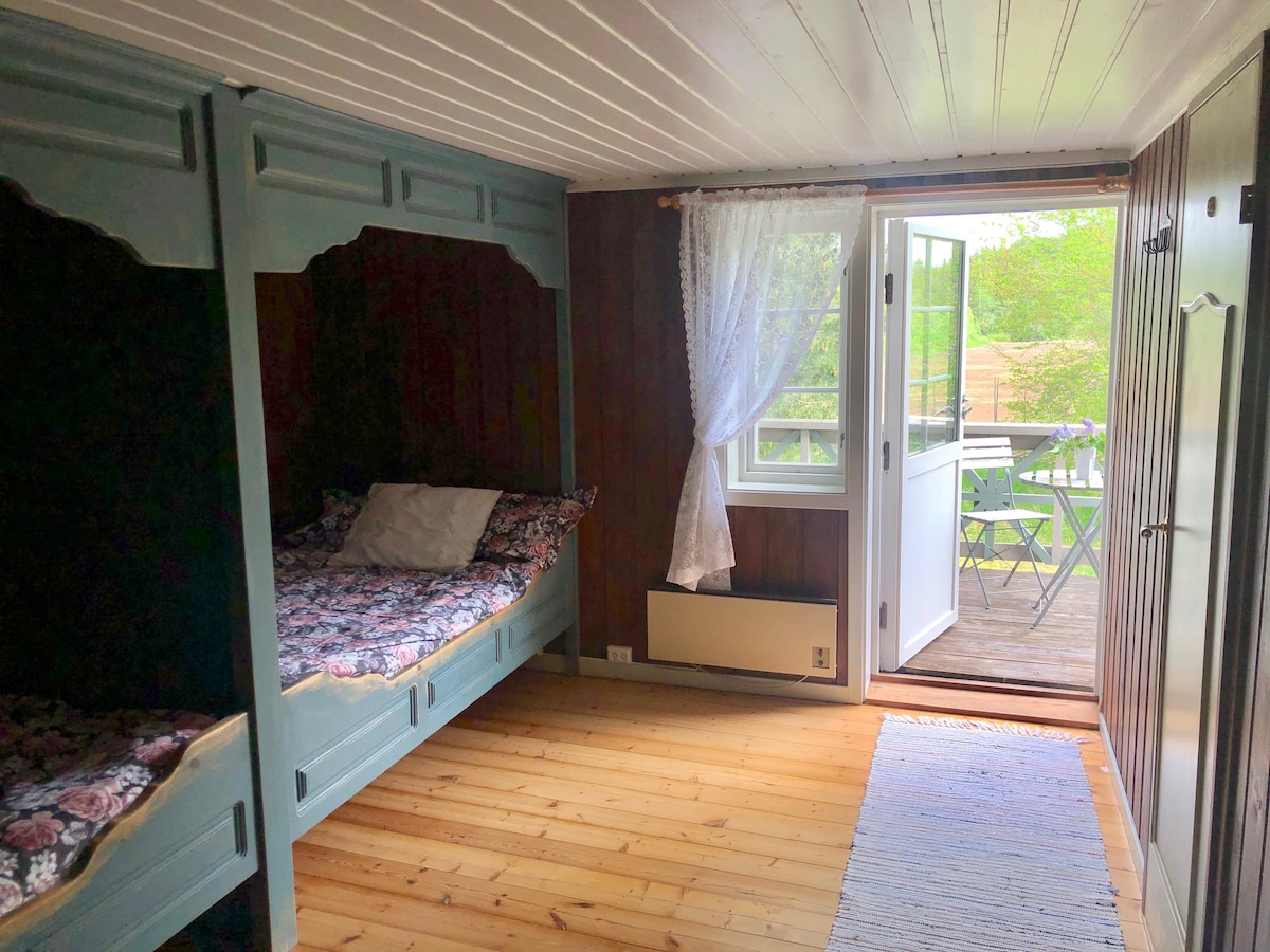 Room 2: Spacious room with two double beds with space for up to four people.  Direct access to a private balcony with a lovely view. 