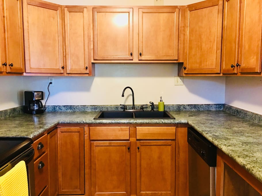 Lots of storage allows the kitchen to remain uncluttered and visually appealing.