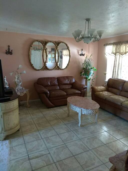 Living room with cable TV and accessibility to purchase movies to b watch.