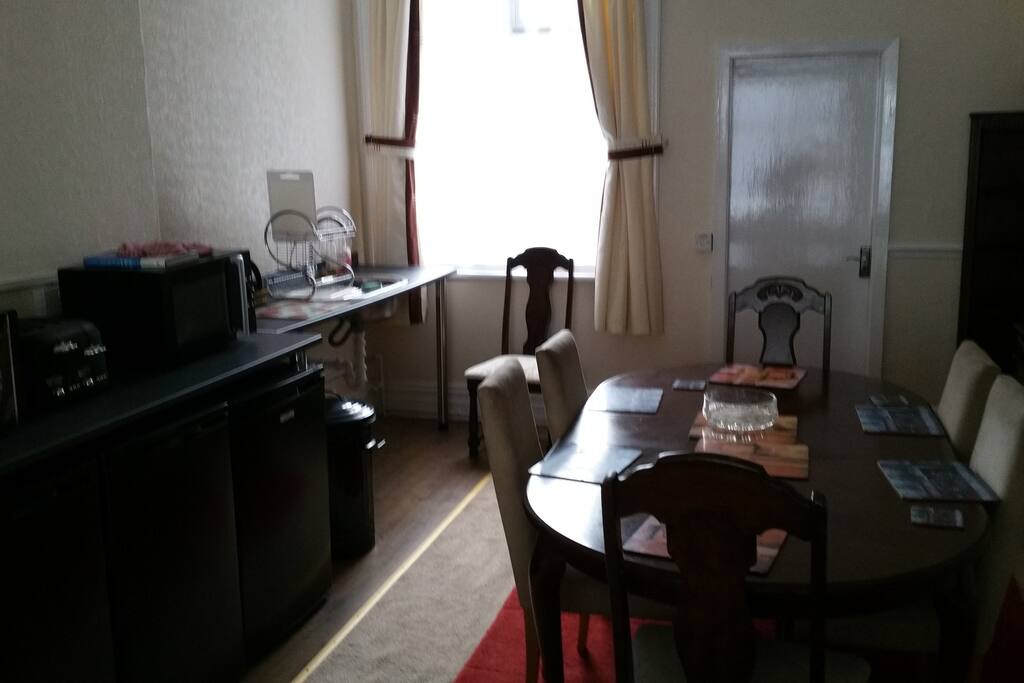 guest dining room with kettle,toaster, fridge , microwaves with grill facility