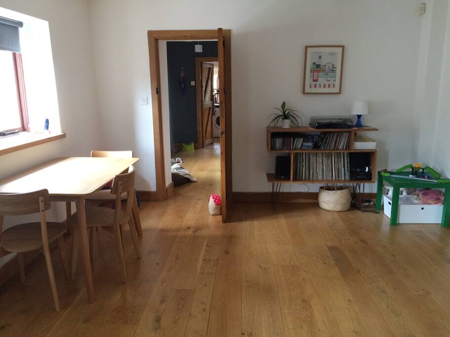 Dining area - table seats six. Cambridge Audio sound system with our vinyl collection. Plus kids corner duplo table, wood track etc.