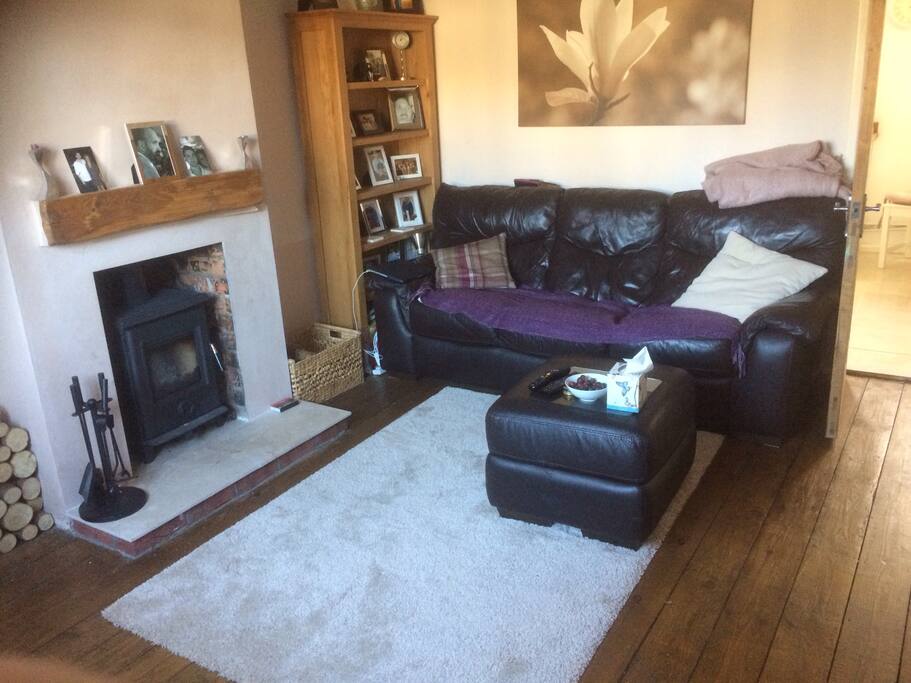 Cosy lounge with log burner