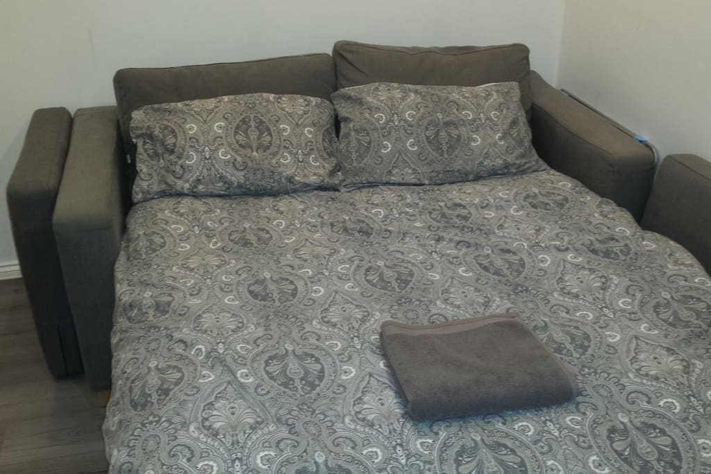 Main Bedroom has quality sofabed which is full double bed