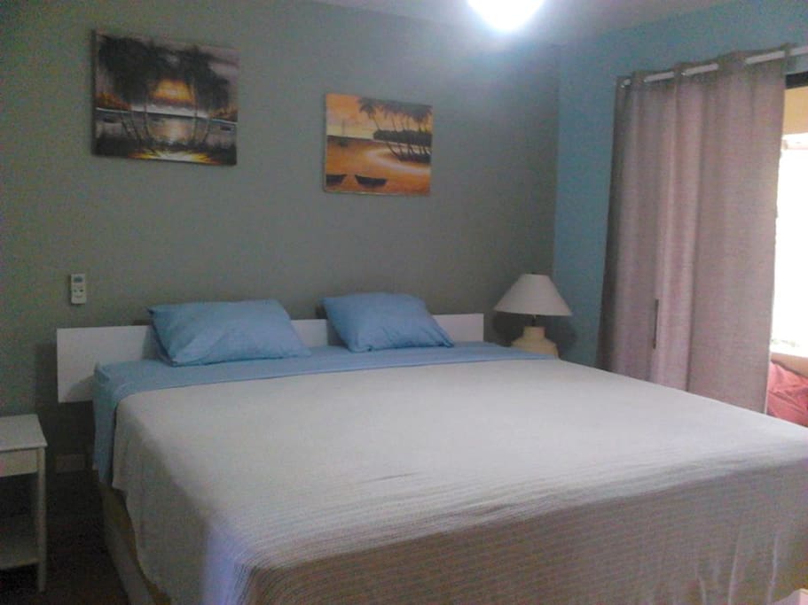 King size bed with pillow top mattress.