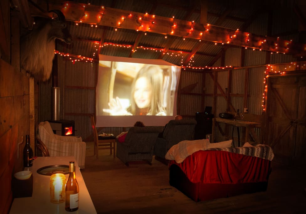 Many of our guests love watching a favourite film in our woolshed movie theatre.