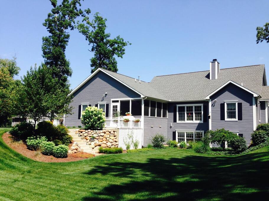 Enjoy the backyard views from our screened in porch