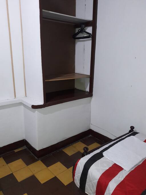 The room has one bed and one closet for your comfort.