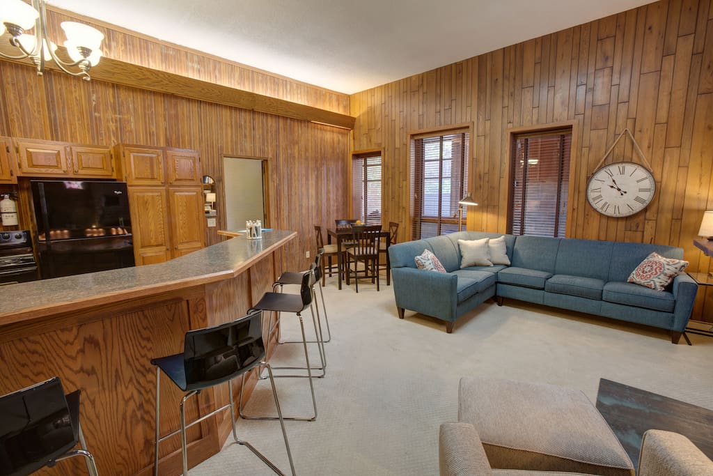 Plenty of seating for dining and/or workspace. End tables are suitable for laptop use.