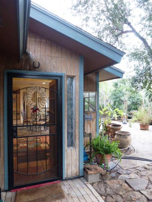 Front door leads to patio/living room