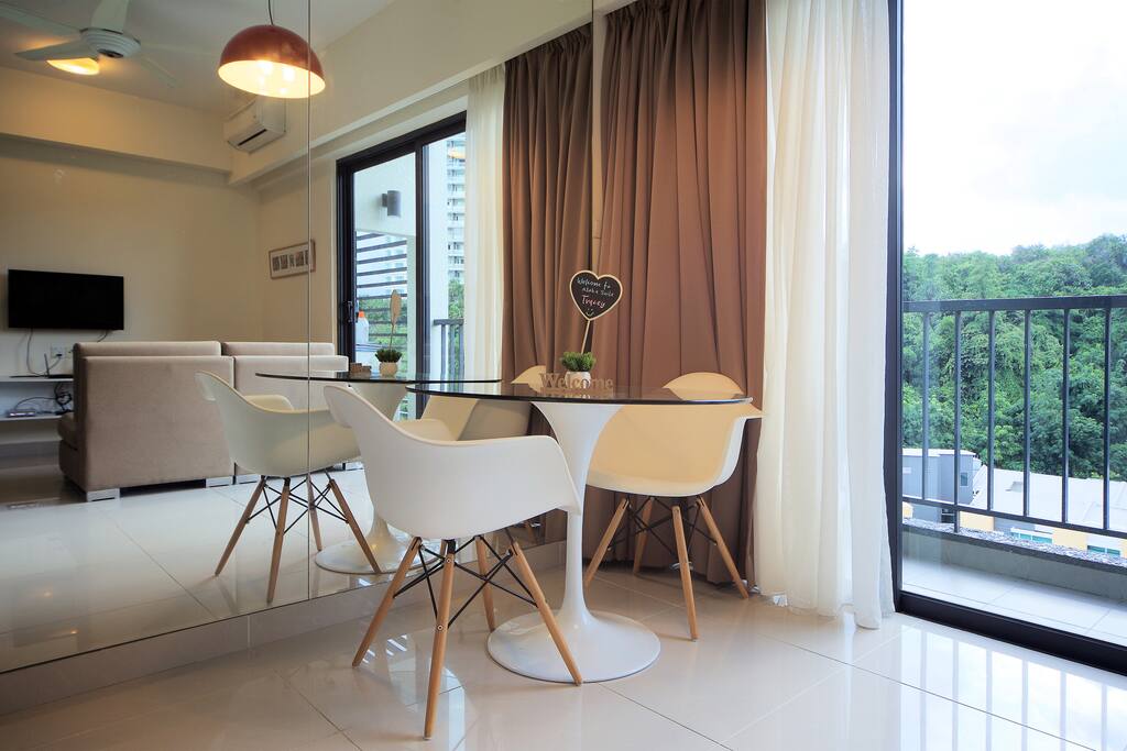 Adjacent dining by the balcony. Enjoy your breakfast while taking in the view!