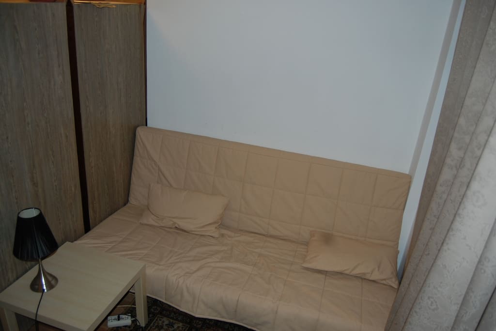 2nd couch/futon - can be made into a double bed