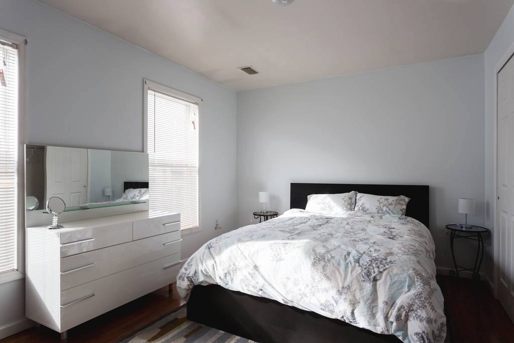 Master bedroom with private full bathroom. Includes 2 closets, 2 drawers, and a study desk.